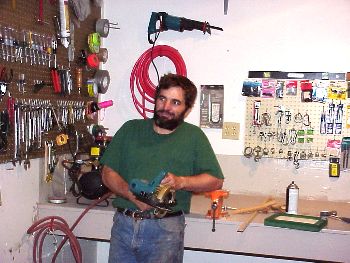 John enjoys his hobby, making furniture in our workshop.