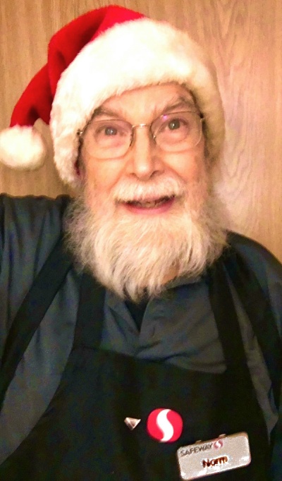 Norm as Cashier at Christmas at Safway